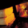 Traditional Swiss raclette over the open fire