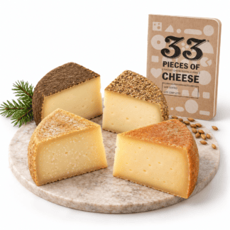 Four Peaks Discovery Flight featuring four artisan Swiss cheeses and an Alpine Express cheese tasting journal.